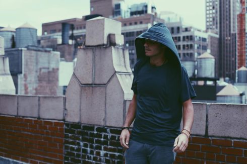 Unisex Jersey Tee, relaxed fit, attached asymmetrical hood. 